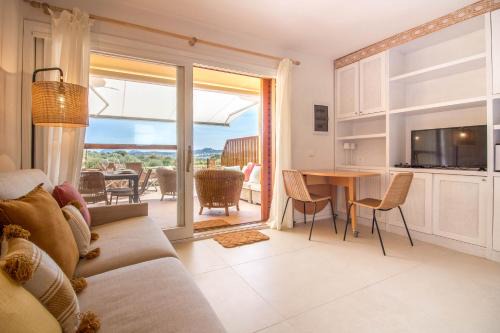Portisco Apartment | Portisco Bouganville Seaside Charm Flat W/Veranda