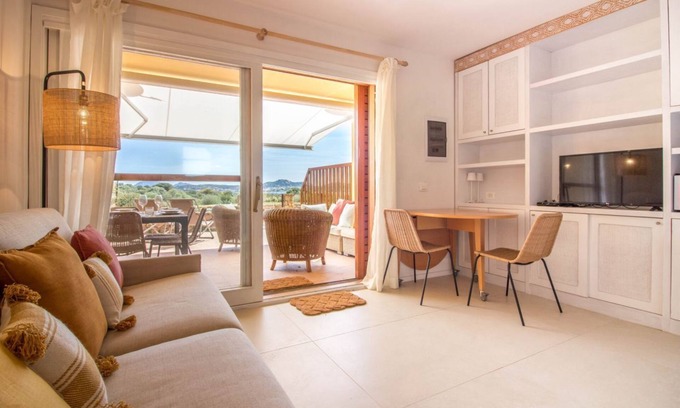 Portisco Apartment | Portisco Bouganville Seaside Charm Flat W/Veranda