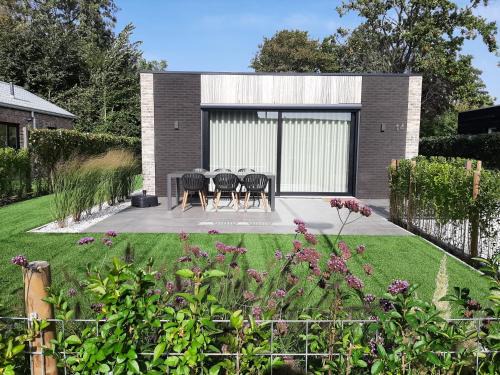 Baarland House | Prachtige bungalow op vakantiepark bij zee.
