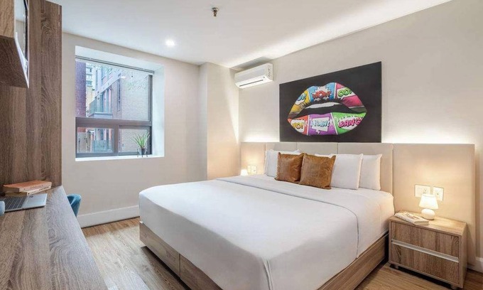 Gay Village House | Prada king– Heart of MTL Stay