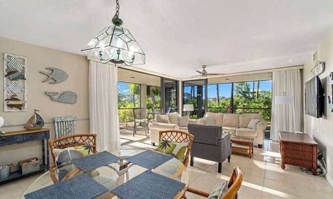 Bonita Bay Apartment | Pristine Corner Unit - Golf Course Views from Quiet Wrap Around Lanai