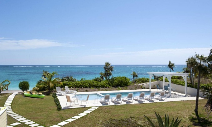 Double Bay House | Private 5-bedroom Beachfront Estate w/Heated Pool on Pink Sand Beach