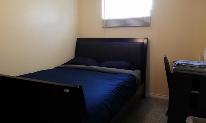 Forest Lawn House | Private Bedroom in Basement with Shared Bathroom - Fonda