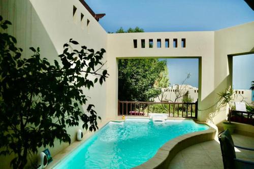 Ras Al Khaimah House | Private guest house in five stars resort