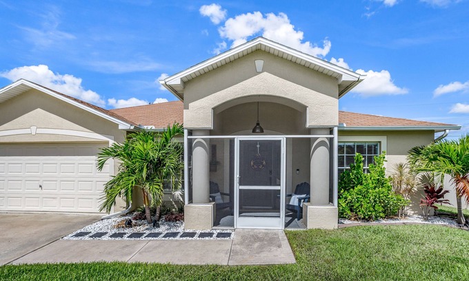 Mariner House | Private home with heated pool, screened lanai, grill, sun deck, & yard games