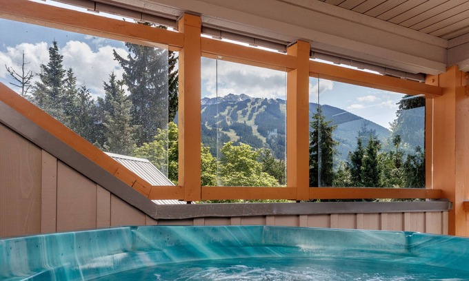 Village North House | Private hot tub, gorgeous view, cozy fireplace, free parking, heated pool!
