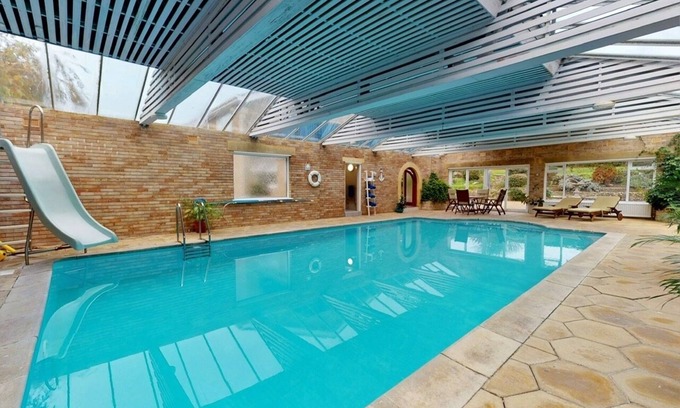 Swanage Apartment | Private indoor heated pool, sauna + snooker room next to Jurassic. Coastal Path