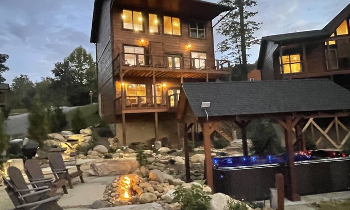 Gatlinburg Cabin | Private Outdoor Space! Waterfall, firepit, arcade Swim Spa, 2 Hottubs