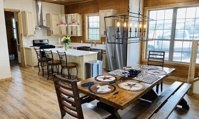 Edwards County House | Private Ranch with well-appointed 4 bed/4 bath log cabin!