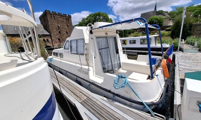 Chenille-Change Boat Rental | Private Riverside Boat Stay in Quaint Chenillé-Changé for 5 Guests