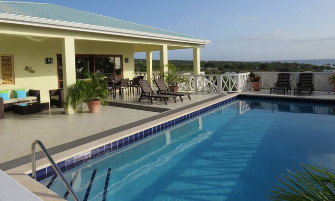 Cades Bay House | Private romantic retreat, ideally located, panoramic views, walk to the beach.
