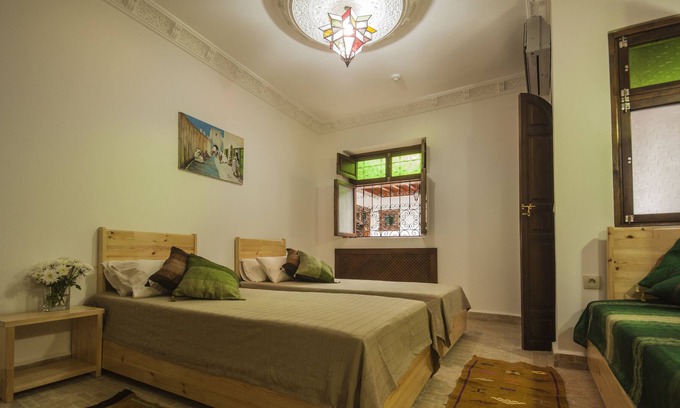 Medina of Tangier House | Private room (tholatha) in a traditional Riad