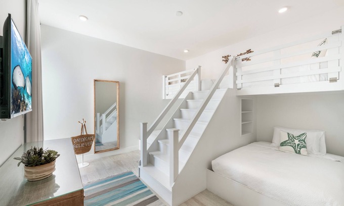 West Bay Condo | Private Seven Mile Beach Club with Roof Terrace, Amazing Pool Pavilion