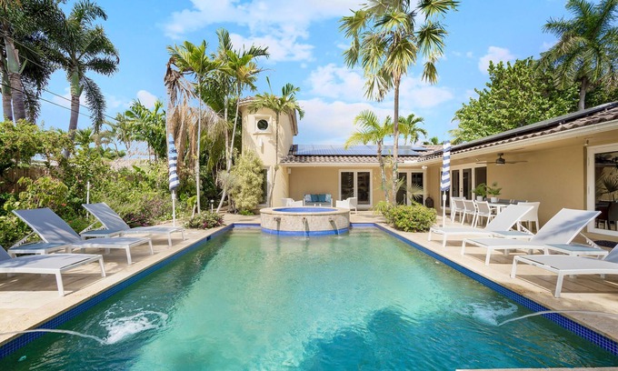 Coral Heights House | Private Tropical Oasis with Heated Pool & Hot Tub! 2 miles to Beach!