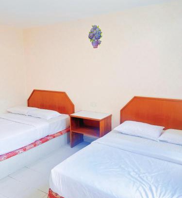 Bukit Kecil House | Quadruple Room with private bathroom
