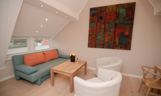 Norderney Apartment | Quiet and relaxation in the archway houses of the northern helmet settlement.