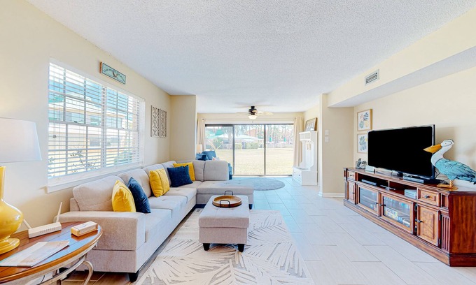 Dauphin Island Condo | Quiet home with WiFi, pool, view of water, & boardwalk to beach