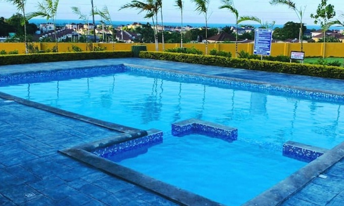 Falmouth House | Quite private villa with pool and gym access 5 min from the beach