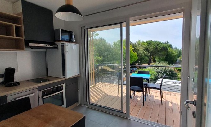Saint-Marc-sur-Mer House | Résidence Salamandre - Maison Bois Cosy Calme avec parking pour 4 à 10 pers idéal couples et familles à 500m de la plage à Saint-Marc-sur-mer