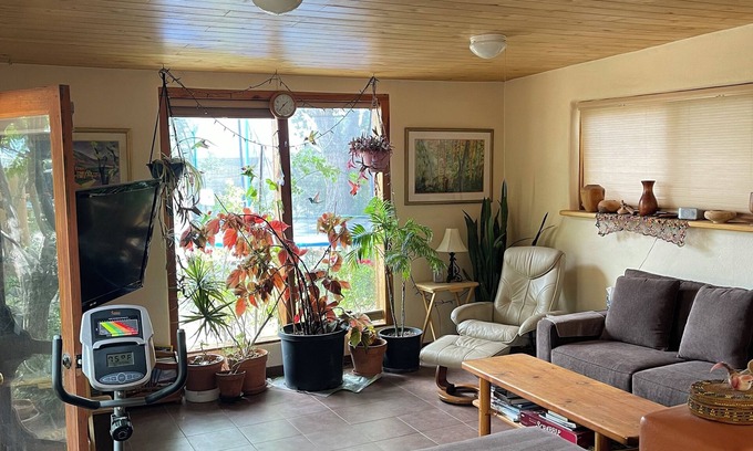 Arroyo Hondo House | Rainbows, Rivers and Sunsets: Unique off-grid solar 3-bedroom home in El Prado