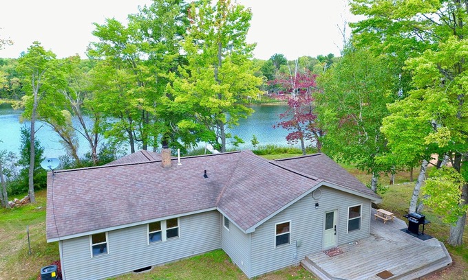 Manistique Cottage | Rare find! Secluded Cottage on inland lake near Munising!