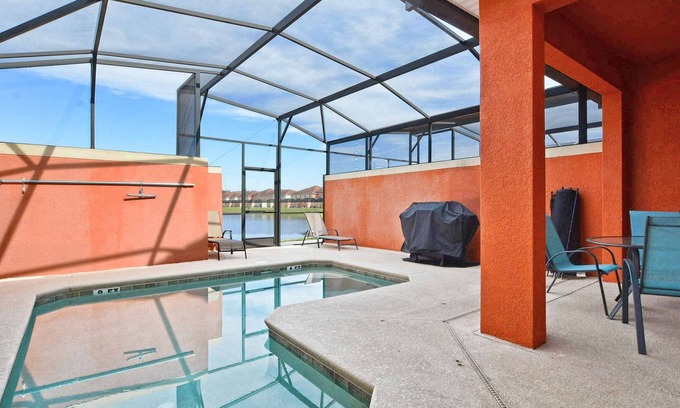 West Kissimmee House | Rare! Lake Front w/ Splashpool, Directly across from The Club House!! Close To Disney, BBQ Grill, No Carpet on First Floor, Free WiFi!