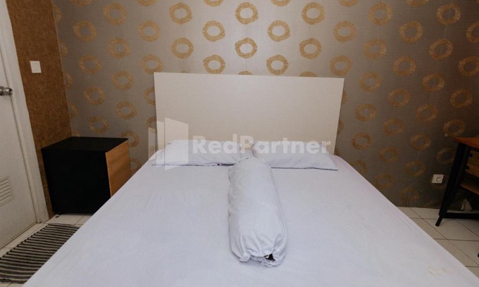 Gunung Putri Hotel | RedLiving Apartemen Podomoro Golf View - Queen Room Tower Dahoma