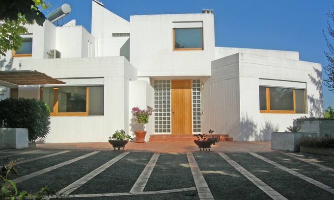 Triggianello Villa | Refined modern architectural design villa in typical Apulian landscape.