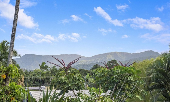 Mooroobool House | Refreshed Family Home with Large Deck and Tropical Mountain View