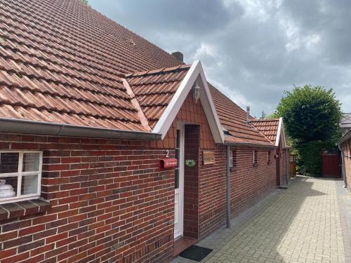 Strackholt Apartment | Reihenhaus in Strackholt mit beheiztem Pool, cleaning included