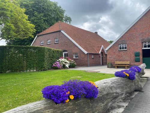 Strackholt Apartment | Reihenhaus in Strackholt mit beheiztem Pool