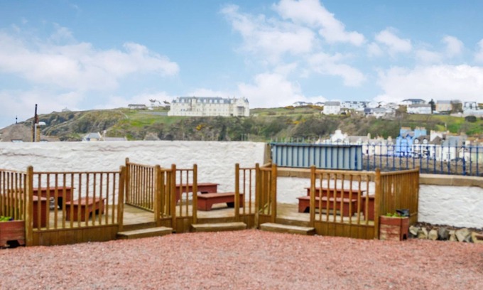 Portpatrick Cottage | Relax and watch the buzz of the harbour from your living room window.