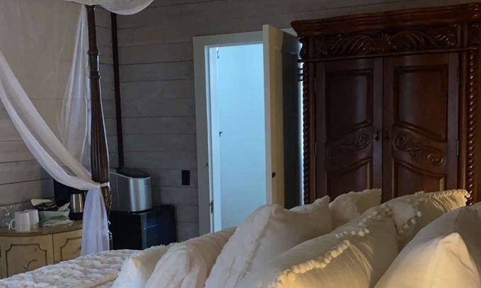 Antlers House | Relax at our unique boutique hotel with a spa, soaking tub, sauna and Speakeasy.