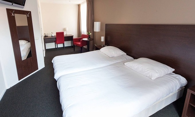 Deventer Hotel | Relax in a Non-Smoking Room with Courtyard, Garden & On-Site Bar in Deventer