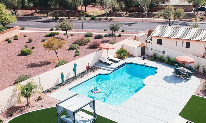 Avondale House | Relax in private heated hot tub or just bask in the sun by the pool.