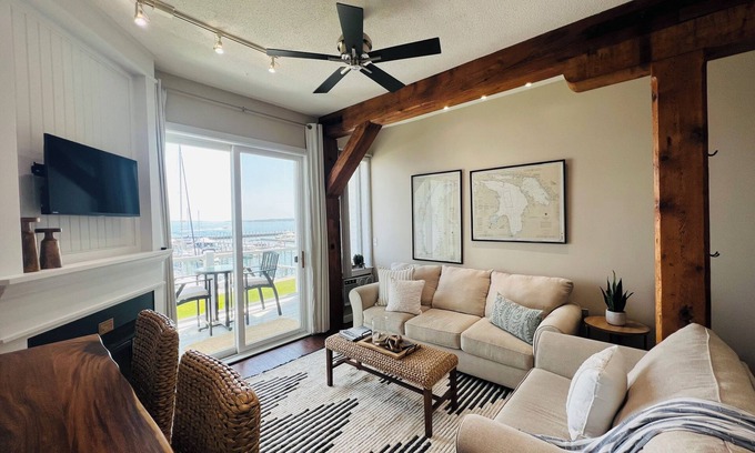 Charlevoix Condo | Relax in this beautiful condo on Lake Charlevoix!