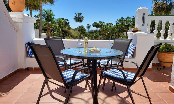 Oasis del Capistrano Apartment | Relax.south facing terrace, all day sun, views of tropical gardens and pools
