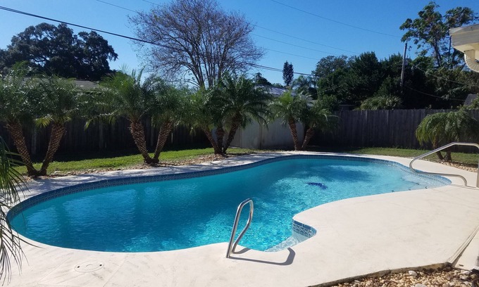 Titusville House | Relaxing Tropical Pool Home Close to Beach and Disney