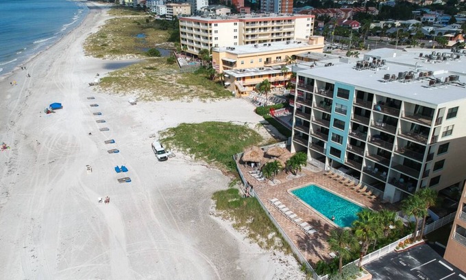 Madeira Beach Condo | Renovated and beachy Sandy Shores Condo- Across from Famous John's Pass!