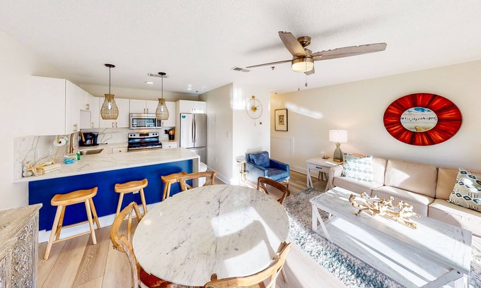 Gulf Place Condo | Renovated condo with on-site pool, hot tub, & tennis courts - easy beach access