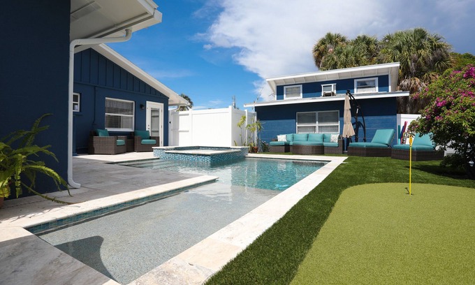 Holmes Beach House | Renovated home w/fenced yard, brand-new pool, spa, foosball - steps to beach