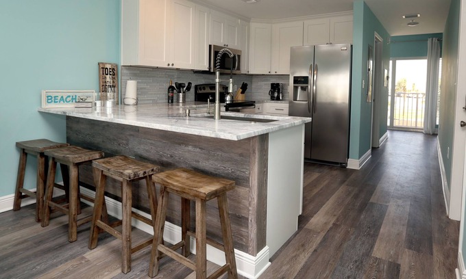 Villa Sabine Townhouses House | Renovated Waterfront Townhome On Little Sabine Bay, Just Steps From The Gulf
