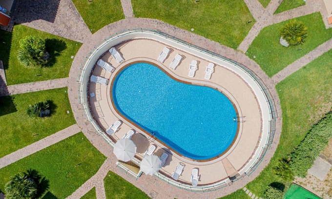 Tergu Apartment | Residenza Le Farfalle 'A' with Garden View, Wi-Fi and Air Conditioning