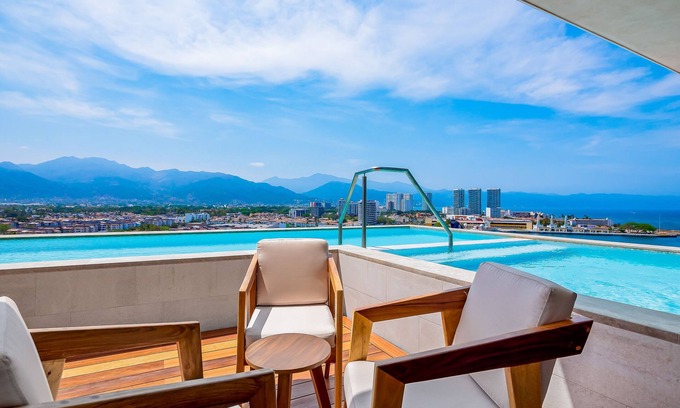 Puerto Vallarta Condo | Resort condo with balcony, scenic view, rooftop pool, & well-equipped kitchen