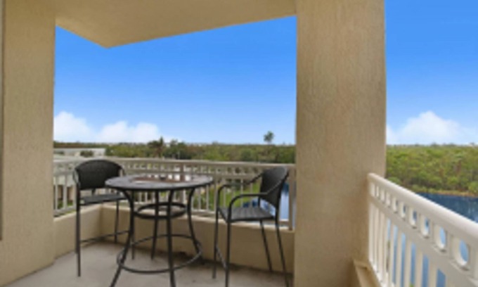 Boynton Beach Condo | RESORT LIVING AT CASA COSTA-OVERLOOKING LAGOON-CORNER UNIT-Walk to Beach!