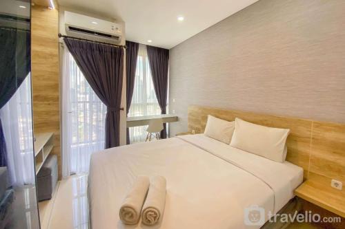 Semanggi Apartment | Restful and Comfortable Studio at Ciputra World 2 Apartment By Travelio