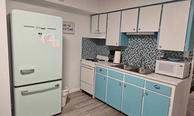Gulf Shores Condo | Retro Retreat: Near beach, beautiful pool, walk to park and coffee shop.