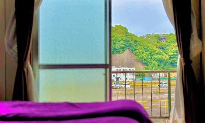 Yokosuka House | Retro Romantic Room! Private rooftop room with a view of Tokyo Bay beyond the Uraga Dock.