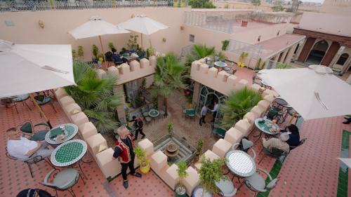 Al Machouar – Stinia House | Riad Golden Mansour
