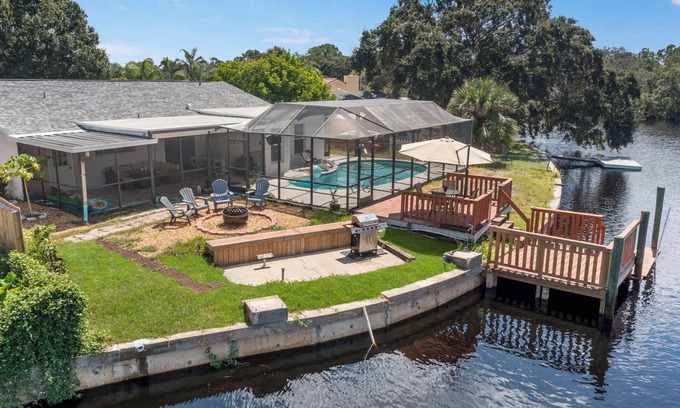 Forest Hills House | River House with heated Pool, Sunsets, Fishing, Dolphin & Manatee Watching